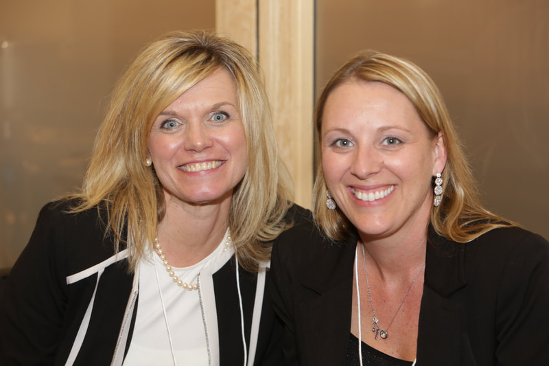 Two women smiling at camera. Left is Susan Jobe, CrossFirst Bank and right is Mary Beth Majors, UMB and Disability:IN GKC board president