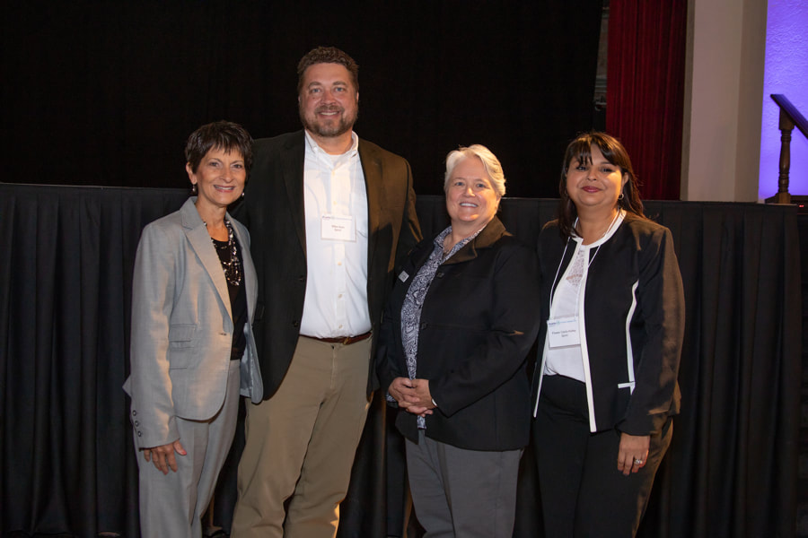 group pic - Brenda Perkins, Mike Horn with Sprint, Darla Wilkerson and Flower Cantu-Kelley with Sprint