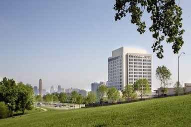 Wide angle view of the Federal Reserve Bank of Kansas City with cityscape in the background